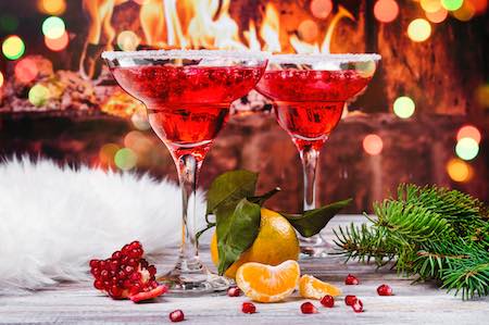 A vibrant pomegranate cosmo cocktail, perfect for festive gatherings
