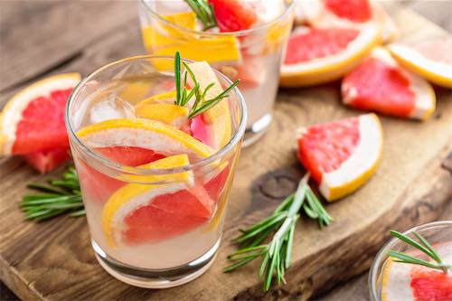 Grapefruit Vodka Fizz with a herb garnish
